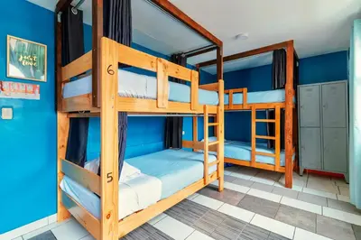 a bunk bed room with two bunk beds at The Secret Garden Hostel in Lima