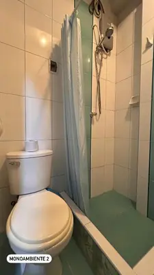 a bathroom with a toilet and a shower at El Viejo Roble in Cusco