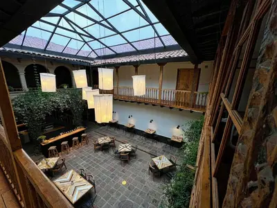 an overhead view of a restaurant with tables and chairs at Casa Tunki in Cusco