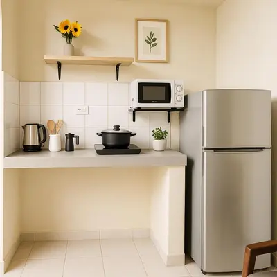 a kitchen with a refrigerator and a microwave at 101 Comfy Apt WiFi kitchen SmartTV Central at Callao in Lima