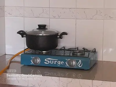 a pot on top of a stove in a kitchen at 301 Comfy Apt WiFi kitchen SmartTV Central at Callao in Lima
