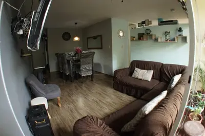 a living room with a couch and a table at Apartamento 3 Habitaciones Lima, Perú (Magdalena del Mar) in Lima