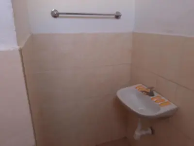 a bathroom with a sink and a toilet at Hotel Duna Sur in Laguna Huacachina