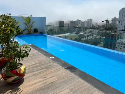 a large swimming pool on the roof of a building at BARRANCO Apartment Lima Peru in Lima