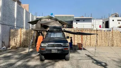 a small car with a tent on top of it at Samay77 Ica in Ica