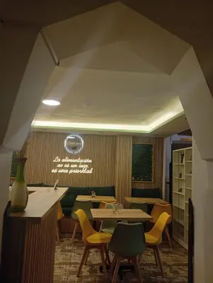 a restaurant with tables and chairs in a room at SQ Estancia Del Inca in Cusco
