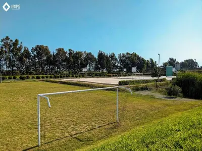 a soccer goal in the middle of a field at HOP LAGO & MAR exclusiva en playa de chincha in Chincha Baja