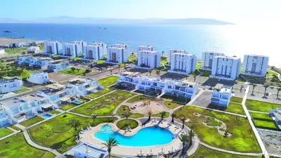 an aerial view of a resort near the ocean at 1 Fila Vista Bahía Paracas - La Velas 501 T1 in Paracas