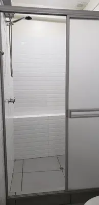 a shower with a glass door in a bathroom at Tilcafé B&B Mollepata in Mollepata