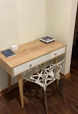 a wooden desk with two books on top of it at Departamento completo Surquillo/Miraflores in Lima