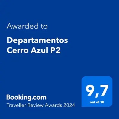 a blue screen with the text awarded to departments centre ayu at Departamentos Cerro Azul P2 in Cerro Azul