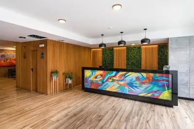 a living room with a large flat screen tv at Barranco inolvidable BR1 in Lima