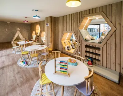 a room with tables and chairs and a mirror at Barranco inolvidable BR1 in Lima