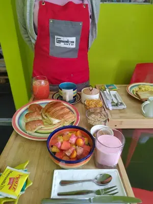 a table topped with plates of food on a table at Casalos Hotel & Spa in Huancayo
