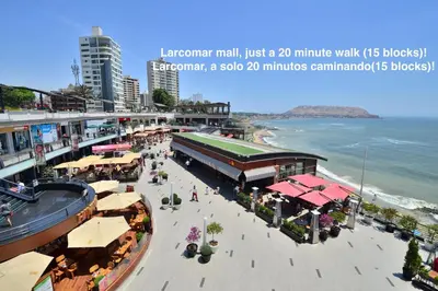 a rendering of a shopping mall at the beach at ALU Apartments - Miraflores in Lima