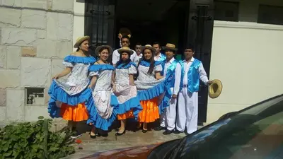 a group of people standing outside of a building at Hotel Kallma Adventures in Ica