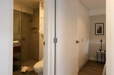 a bathroom with a toilet and a shower at Monumental by Wynwood House in Lima