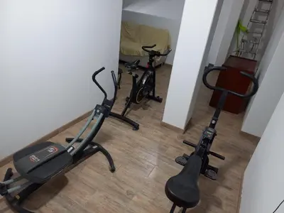 two exercise bikes are parked in a room at Hospedaje Margarita in La Merced
