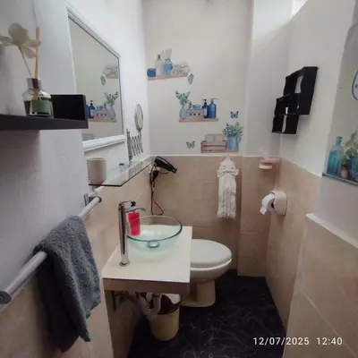 a bathroom with a sink and a toilet in it at Barranco monumental in Lima