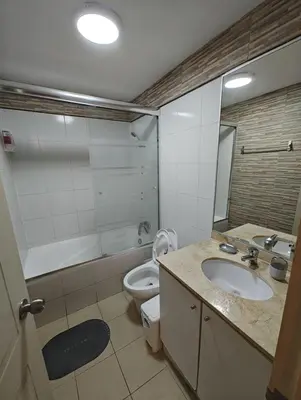 a bathroom with a sink and a toilet at Dpto PARQUE SAN FELIPE in Lima