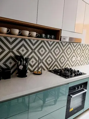 a kitchen with a stove and a counter top at Vistamar Duplex in Lima
