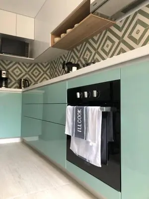 a kitchen with a stove with towels on the oven at Vistamar Duplex in Lima