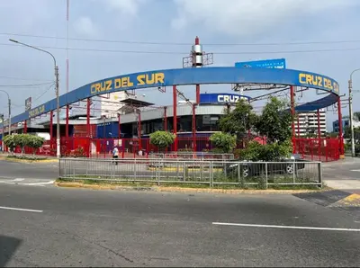 a building with a blue dome and a stadium at Serenzza Hotel in Lima