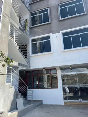 a building with stairs in front of it at Casa Galarza in Huancayo