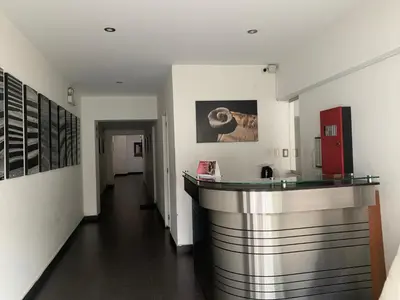 a hallway with a bar in a building at MLA apartments - Larcomar in Lima