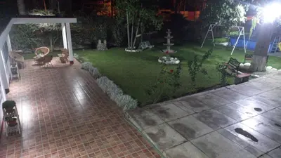 a backyard with a garden with a lawn sidx sidx sidx sidx at casa campestre marina in Chaclacayo