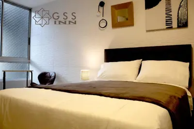 a bedroom with a large bed in a room at Beautiful apartment Near airport /cozy Oceanfront in Lima