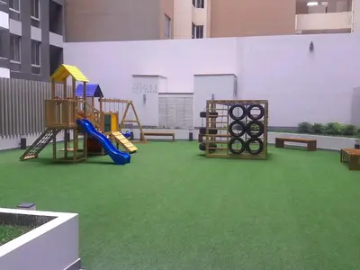 a playground with a slide at Beautiful apartment Near airport /cozy Oceanfront in Lima