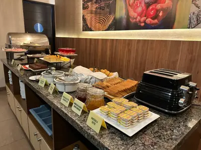 a buffet of food on a counter in a restaurant at El Tambo 1 in Lima