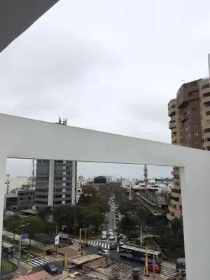 a view of a city with buildings and a street at Precioso cuarto dentro de un apartamento centrico compartido in Lima