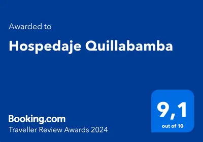 a blue sign with the words hospedia ullmalania at Hospedaje Quillabamba in Santa Teresa