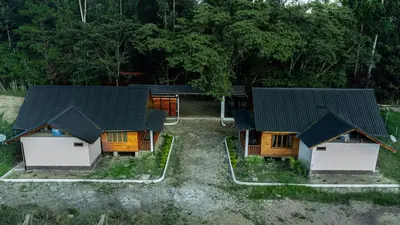 an overhead view of three houses with roofs at Cabañas - Kobold Haus in Oxapampa