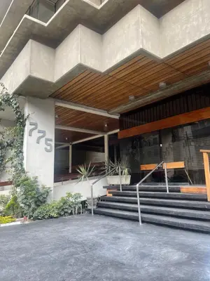 a building with stairs in front of a building at (11) Nuevo y acogedor departamento en Miraflores. in Lima