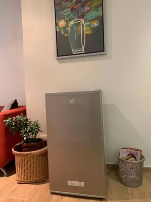a metal appliance sitting on the floor in a room at Confortable and functional apartment in MIRAFLORES ! in Lima
