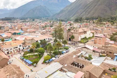 an aerial view of a town with mountains in the background at Suite Panorámico 304 in Urubamba