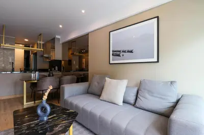 a living room with a couch and a table at Morada by Wynwood House in Lima