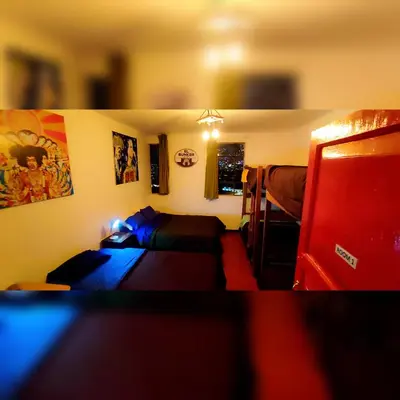 a living room with a couch and a table at Antis Apartment in Cusco