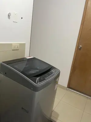 a kitchen with a stove top on top of a trash can at MH Apartments Ica 2 in Ica