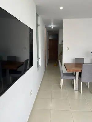 a dining room with a table and chairs at MH Apartments Ica 2 in Ica