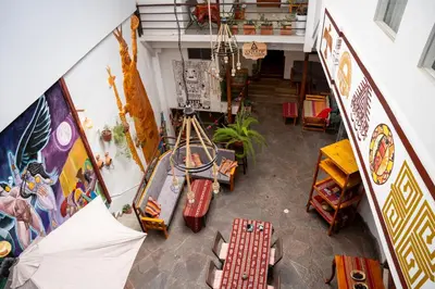 an overhead view of a room with tables and chairs at Casa Antade Cusco in Cusco