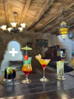 a group of four cocktails sitting on a table at Darenas Hacienda in Aucallama