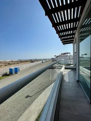 a building with a view of the beach at Moderno Departamento con Piscina y Parrilla, 3 min de la playa, Asia in Asia