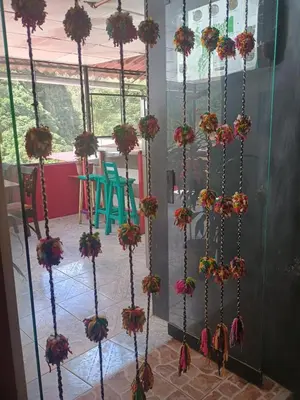 a room with a bunch of flowers on the wall at ECO ART Best view Machu Picchu in Machu Picchu