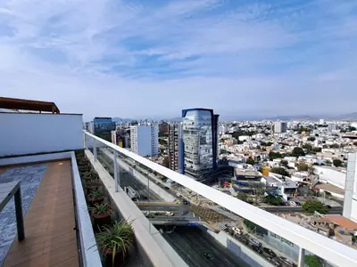 a view of a city from the balcony of a building at VK Loft - Apartamento en Miraflores in Lima
