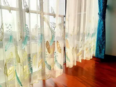a row of curtains in front of a window at Hermoso apartamento Unidos En Familia en JESÚS MARÍA in Lima