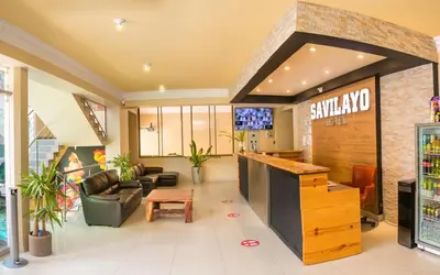 a lobby of a soda shop with a counter at Hotel Savilayo in Ica
